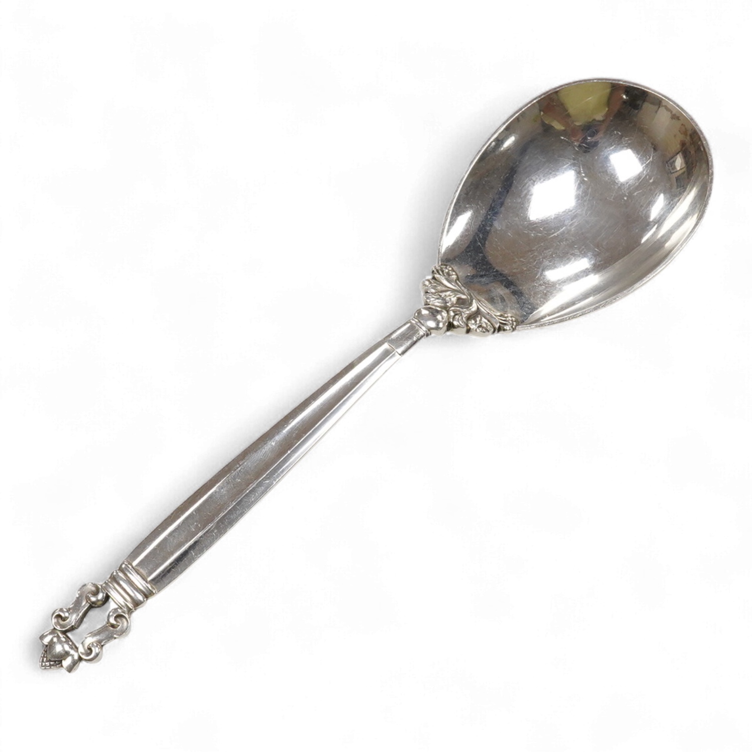 A Georg Jensen mid to late 20th century sterling acorn pattern serving spoon, 22.6cm